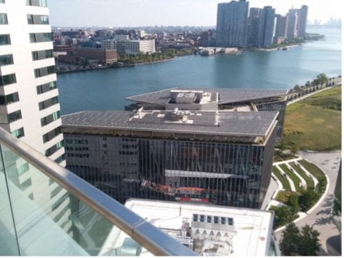 Aerial View of Photovoltaic Canopies atop Tata Building