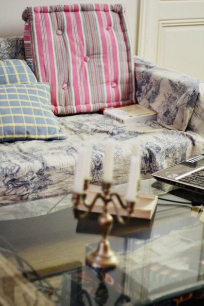 Textured pillows and antique accents in an apartment