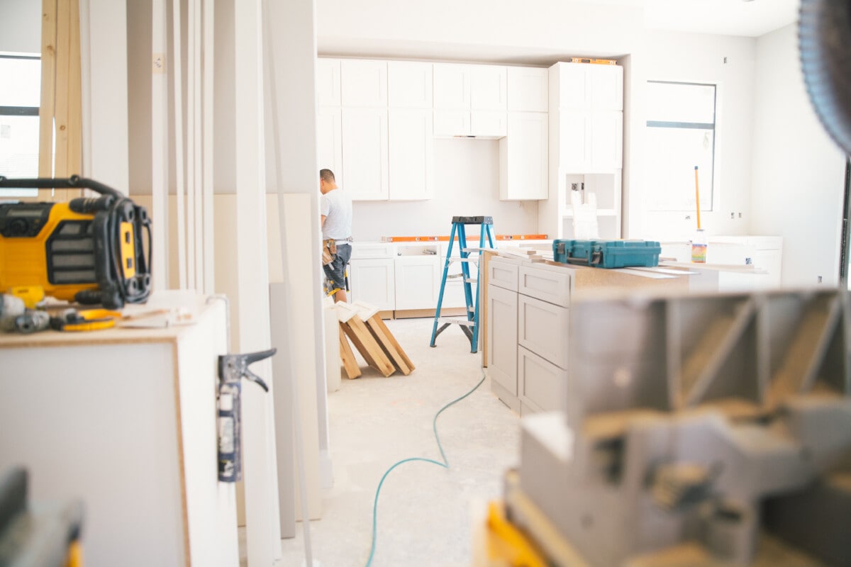 Installing a kitchen in a new house.