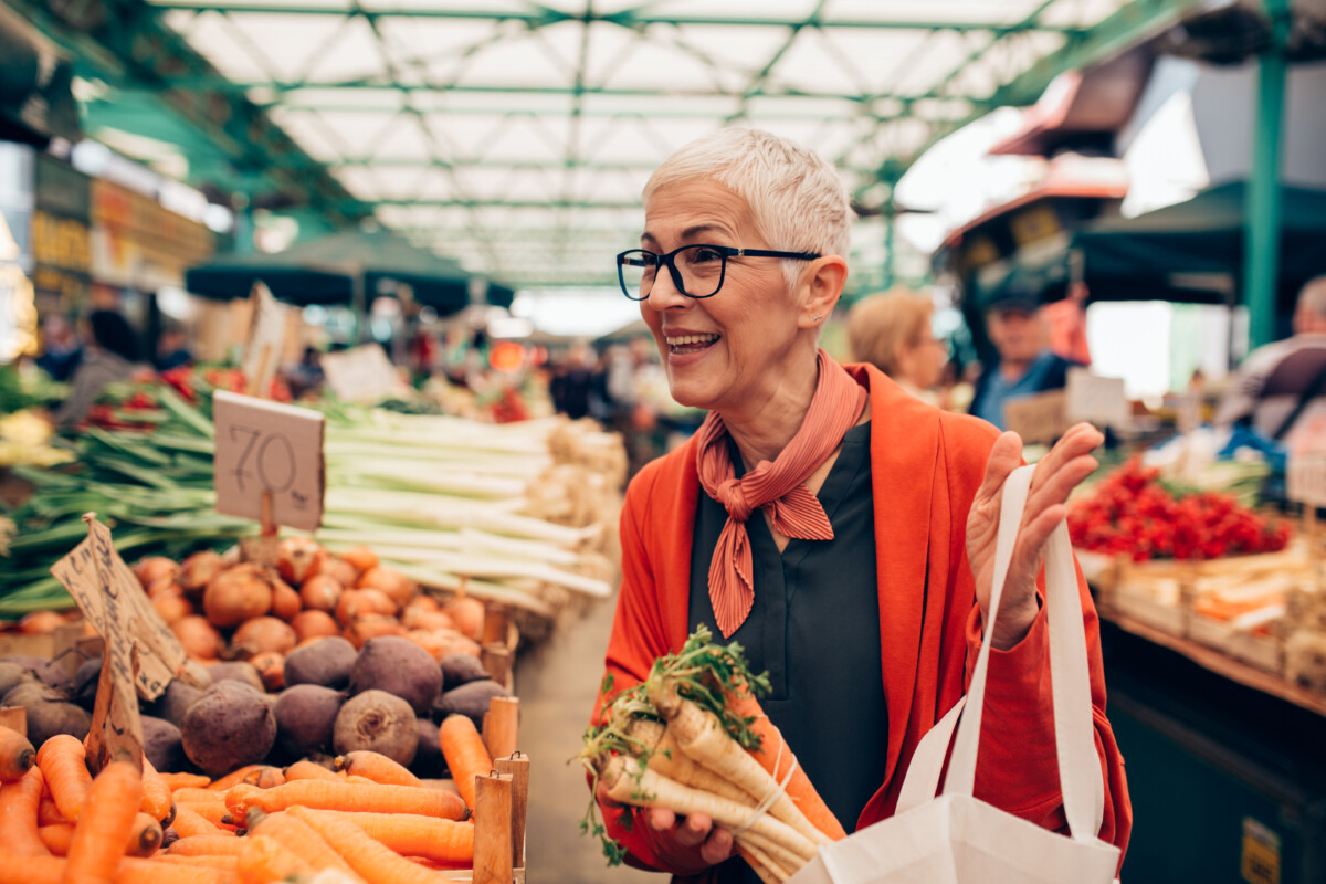Senior woman shopping at market
