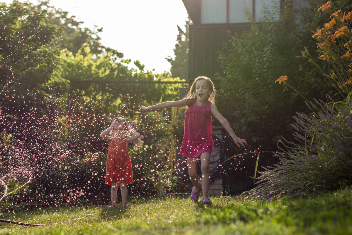 Summer outdoor water fun in the backyard