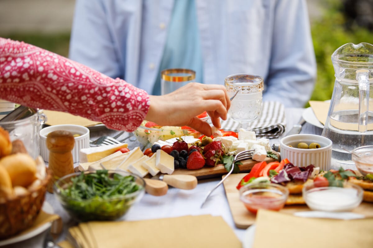 group around a charcuterie board