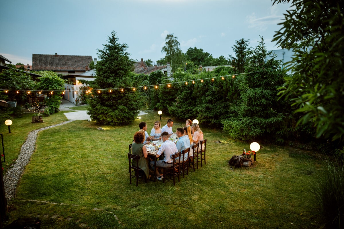 family enjoying the backyard in the vacation rental for the eek