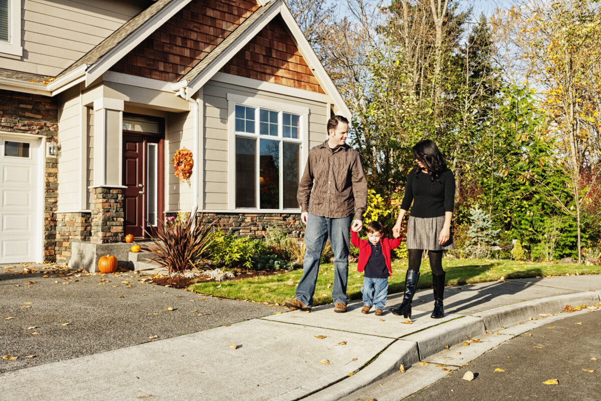 Young Family Coming Home From a Walk