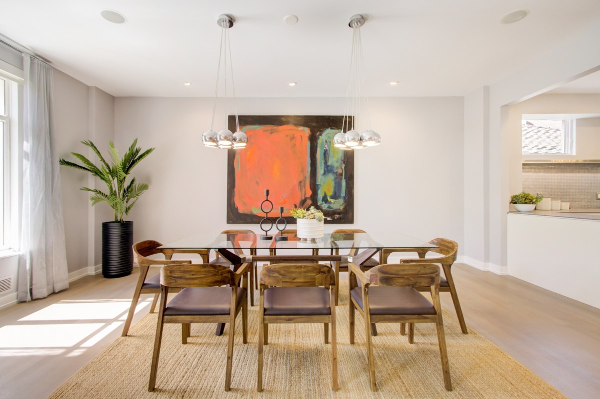 statement art piece in minimal dining room
