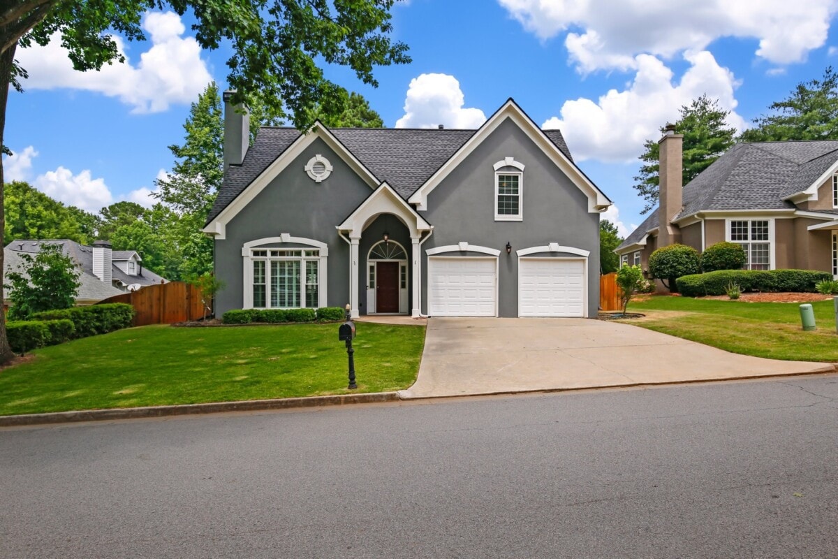 grey and white home in Johns Cree Georgia