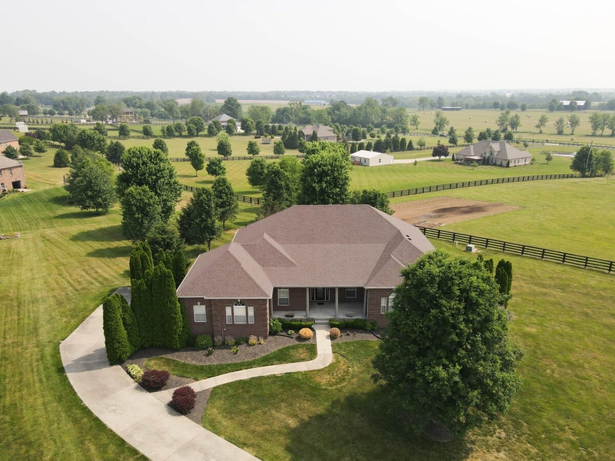 large brown home on land in kentucky