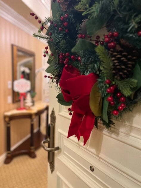A holiday wreath using pine accents