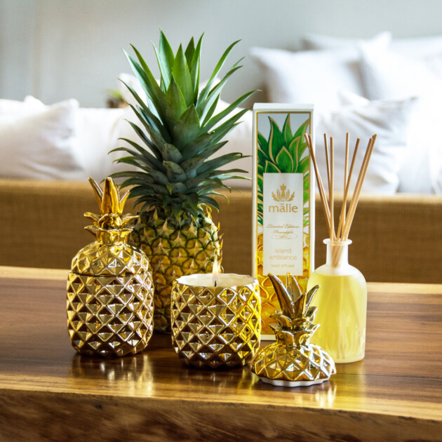 Gold pineapple shaped candles and scent diffusers
