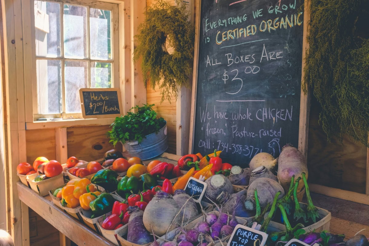 Chalkboard and vegetables at a Farmers Market