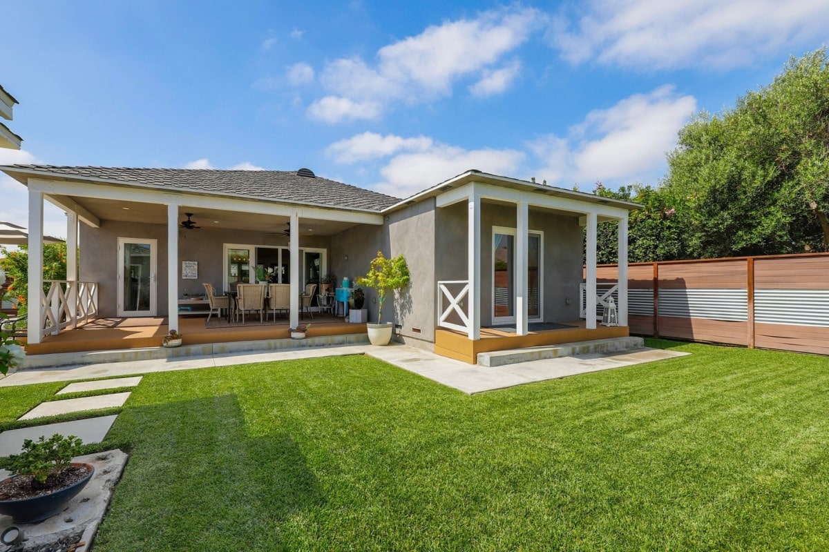 landscaped-backyard-with-patio-blue-sky