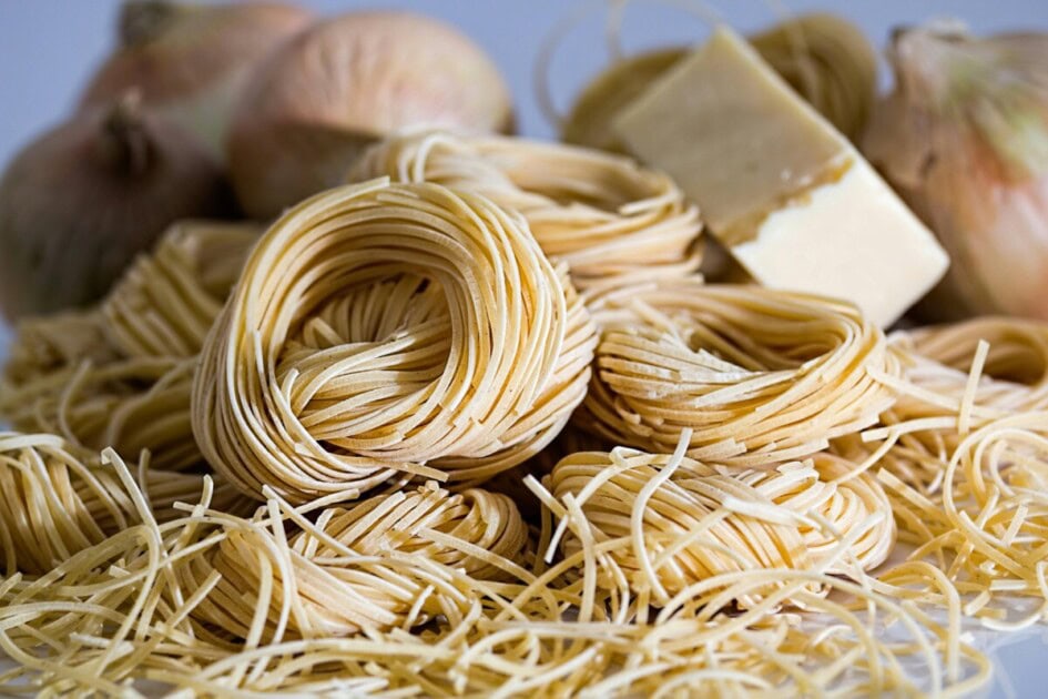 Photo of an assortment of dry pasta and cheeses