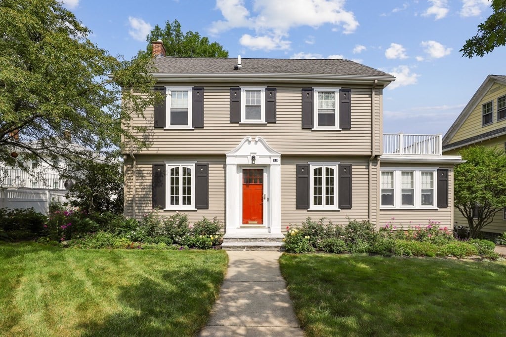 Exterior of home with red door