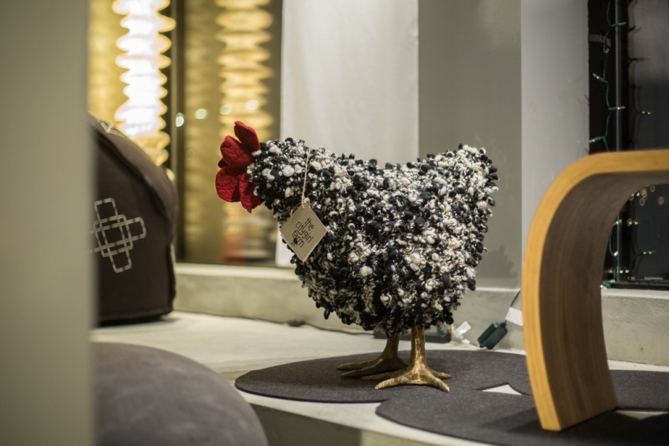 A decorative fabric statuette of a chicken available from Baboo.