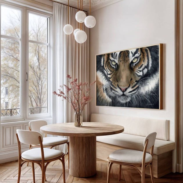 Art of a tiger's eyes by Brett Blumenthal Art above a dining room table setting.