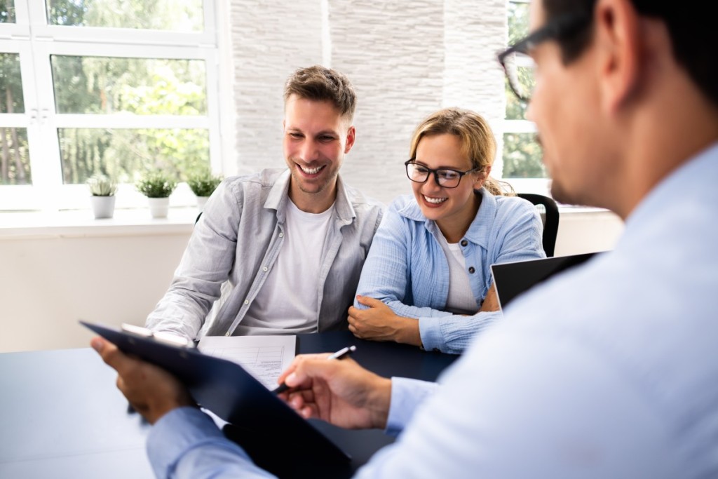 A group of people discussing a contingent offer.