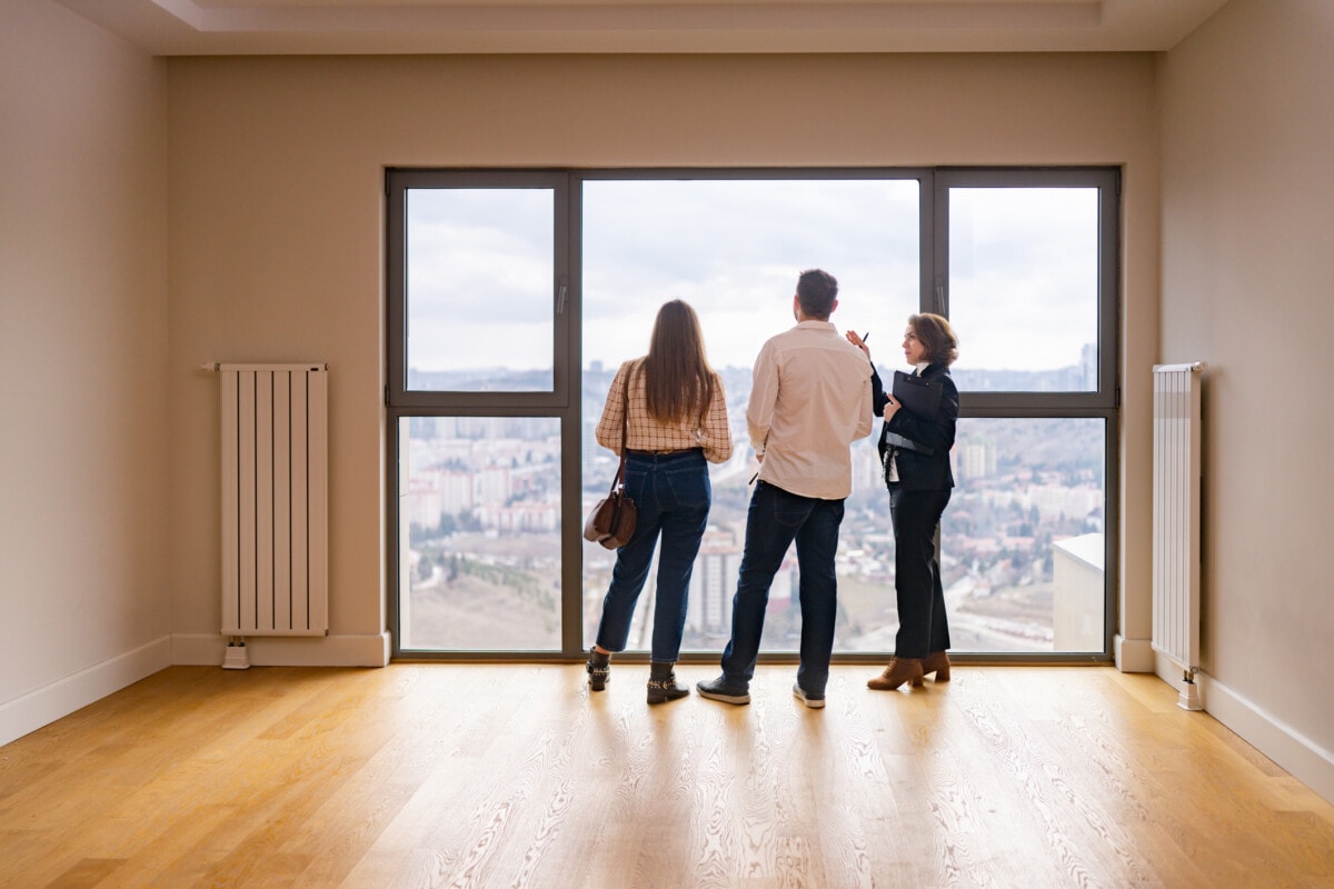 Rental agent showing prospects an apartment 