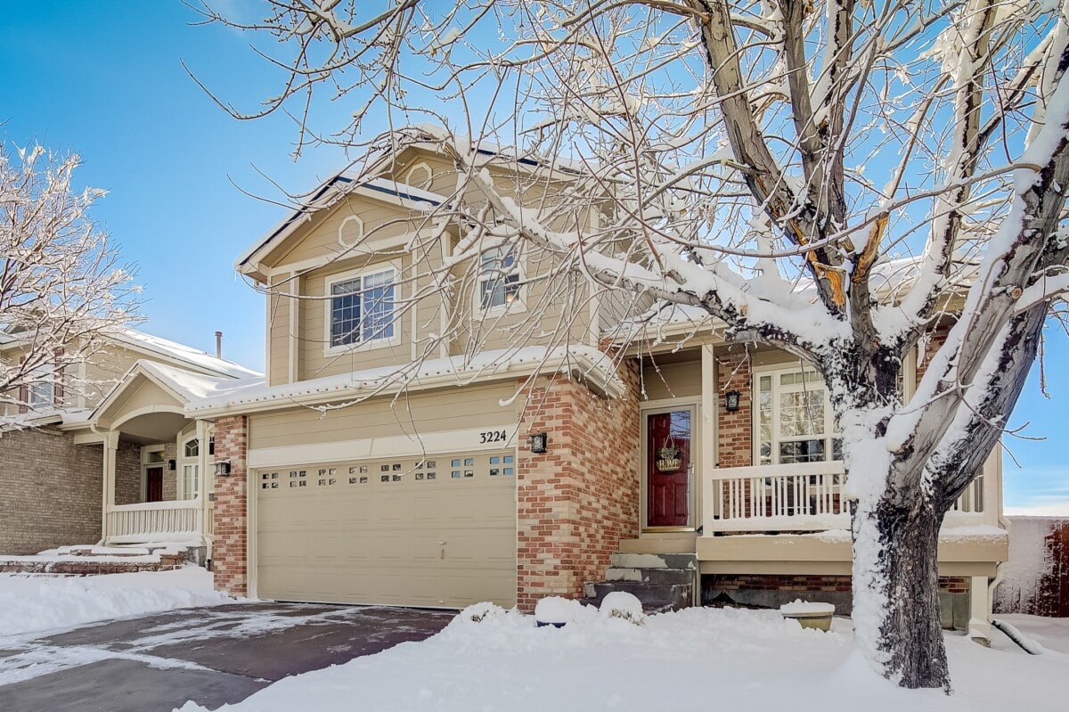 two story home with porch in thornton co