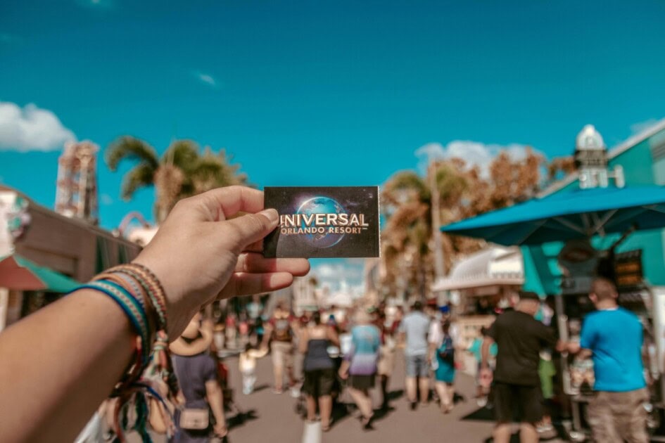 Person holding universal studio ticket, one of the many unique things to do in Orlando.