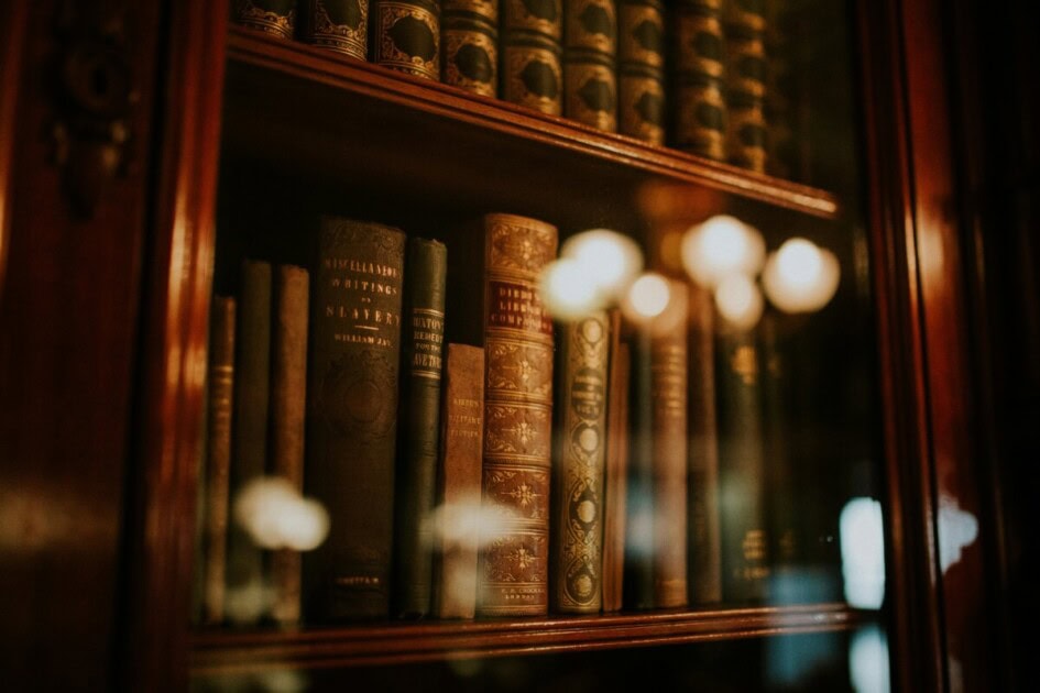 A vintage bookcase with antique books