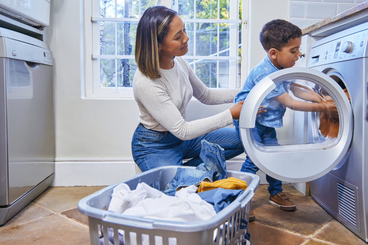 Little boy helping mom with chores