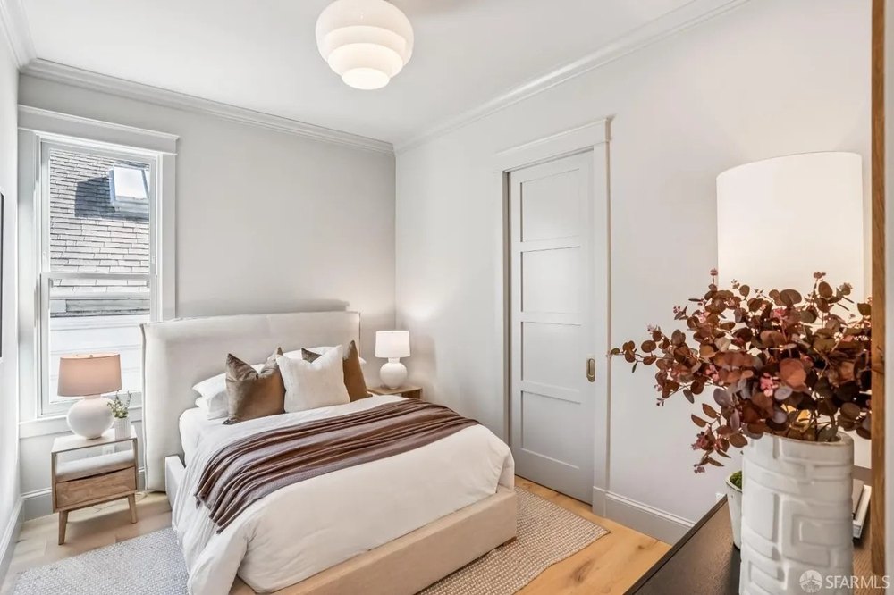 Serene Minimalist Bedroom with Warm Accents