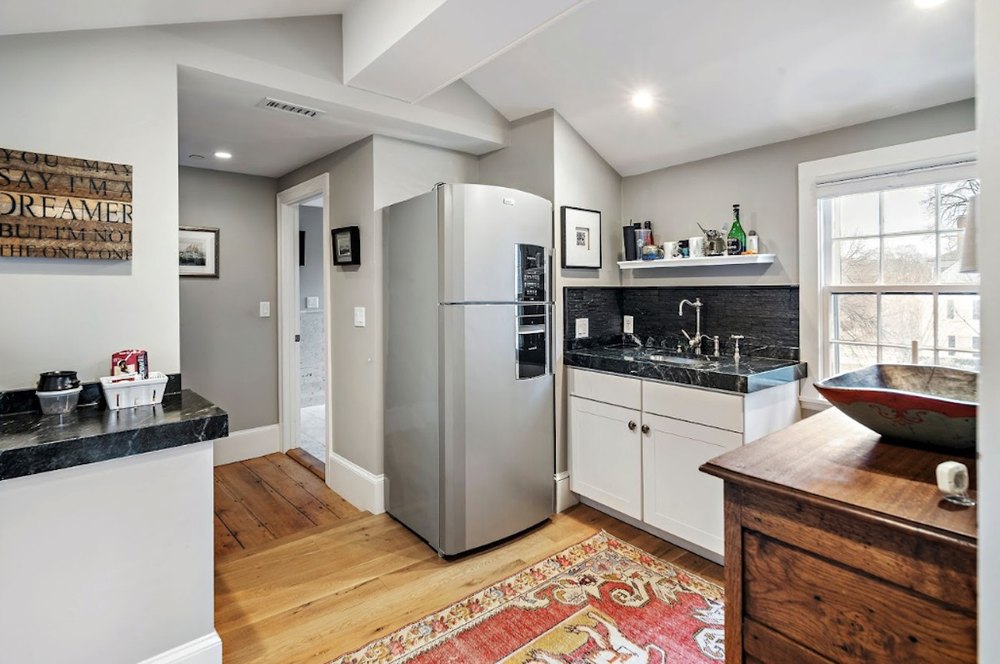 owners apartment with kitchenette