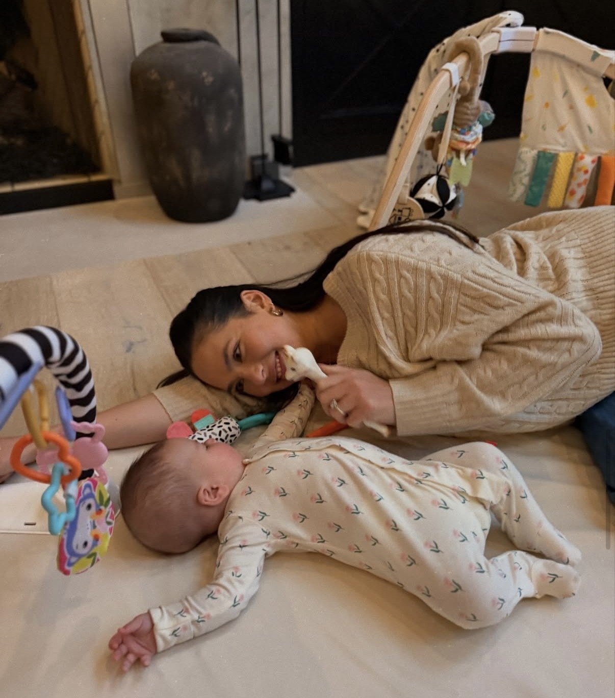 The Goff's baby nursery in Michigan leans into all things girly, such as "muted pink tones," ruffles, rattan baskets, and stripes.