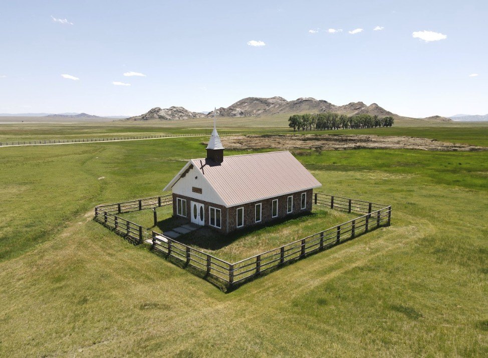 Numerous buildings were included in the sale, from multiple ranch houses to outbuildings to barns—even a church. 
