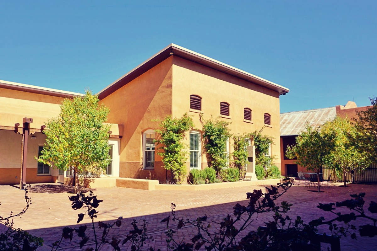 Santa Fe or Pueblo Revival style home in a southwestern area