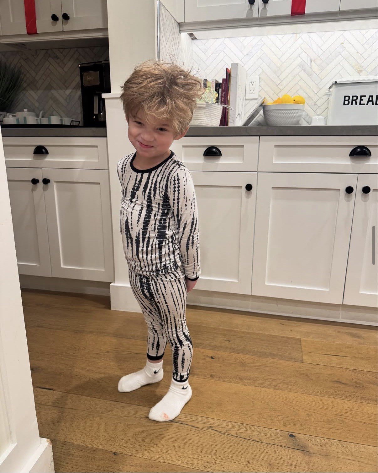 Cartwright lives with her 4-year-old son Cruz Cauchi inside the L.A. home that she describes as "white and neutral and clean."