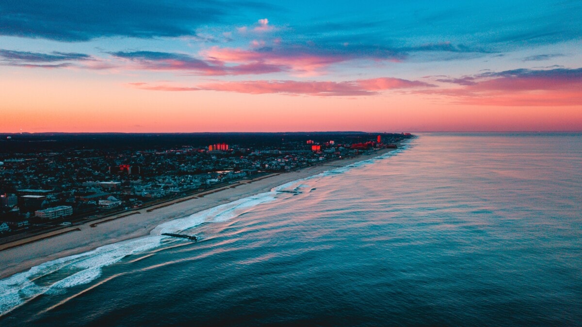 asbury park new jersey at sunset with pink clouds