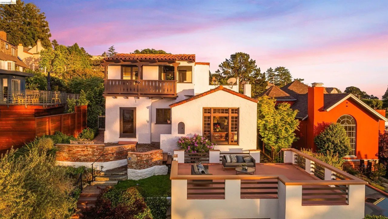 A Spanish-style hillside home in Berkeley, CA at sunset