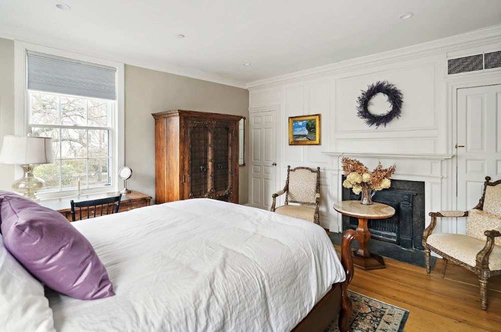 Ensuite guest room with fireplace