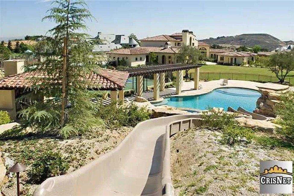 Longtime talk show host Dr. Phil loses bankruptcy trial Pool slide at Dr. Phil's Calabasas home