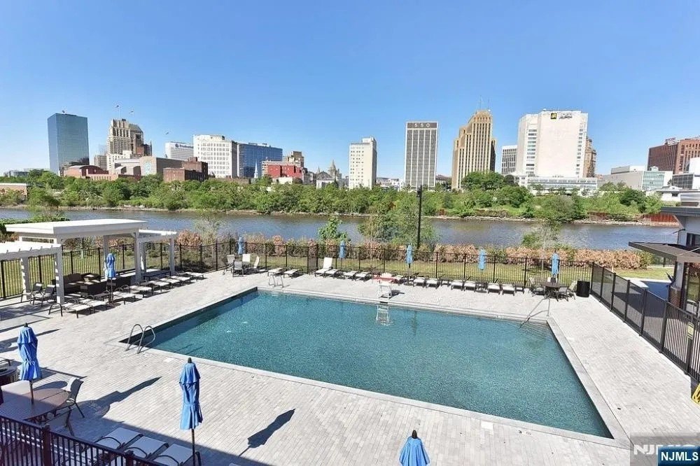 The two-bedroom condo comes with access to the community pool.