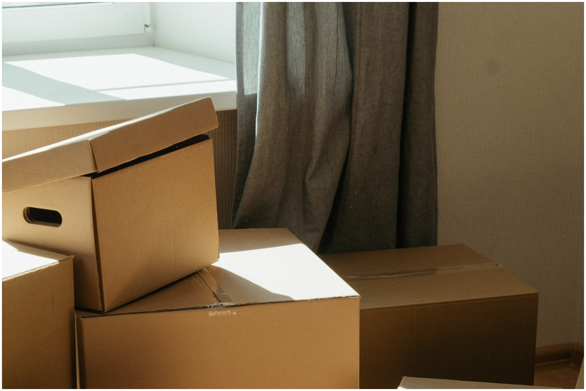 packing boxes by the window