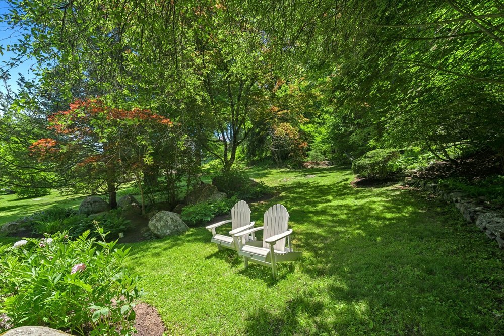 Backyard of home part of the Pollinator Pathway Project in Wilton, CT, on sale for $865,000