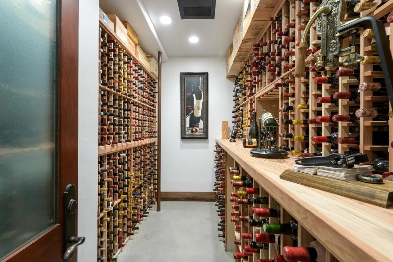 The lower level also contains a temperature controlled wine cellar that holds 3,000 bottles.