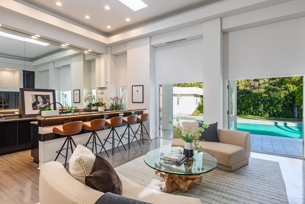 Bar and sitting area in the Designer of Kate Hudson's 'How to Lose a Guy in 10 Days' Yellow Dress Home