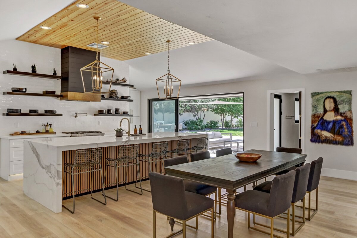 chic luxury kitchen and dining room with wood panels