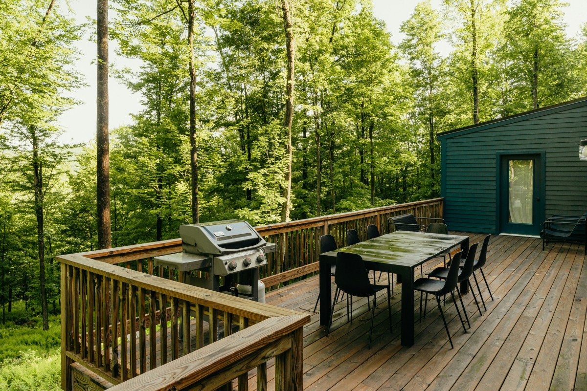 outdoor deck with furniture and grill