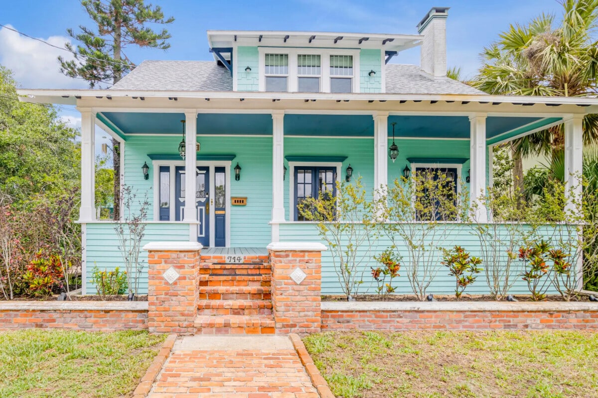 teal craftsman style home in florida