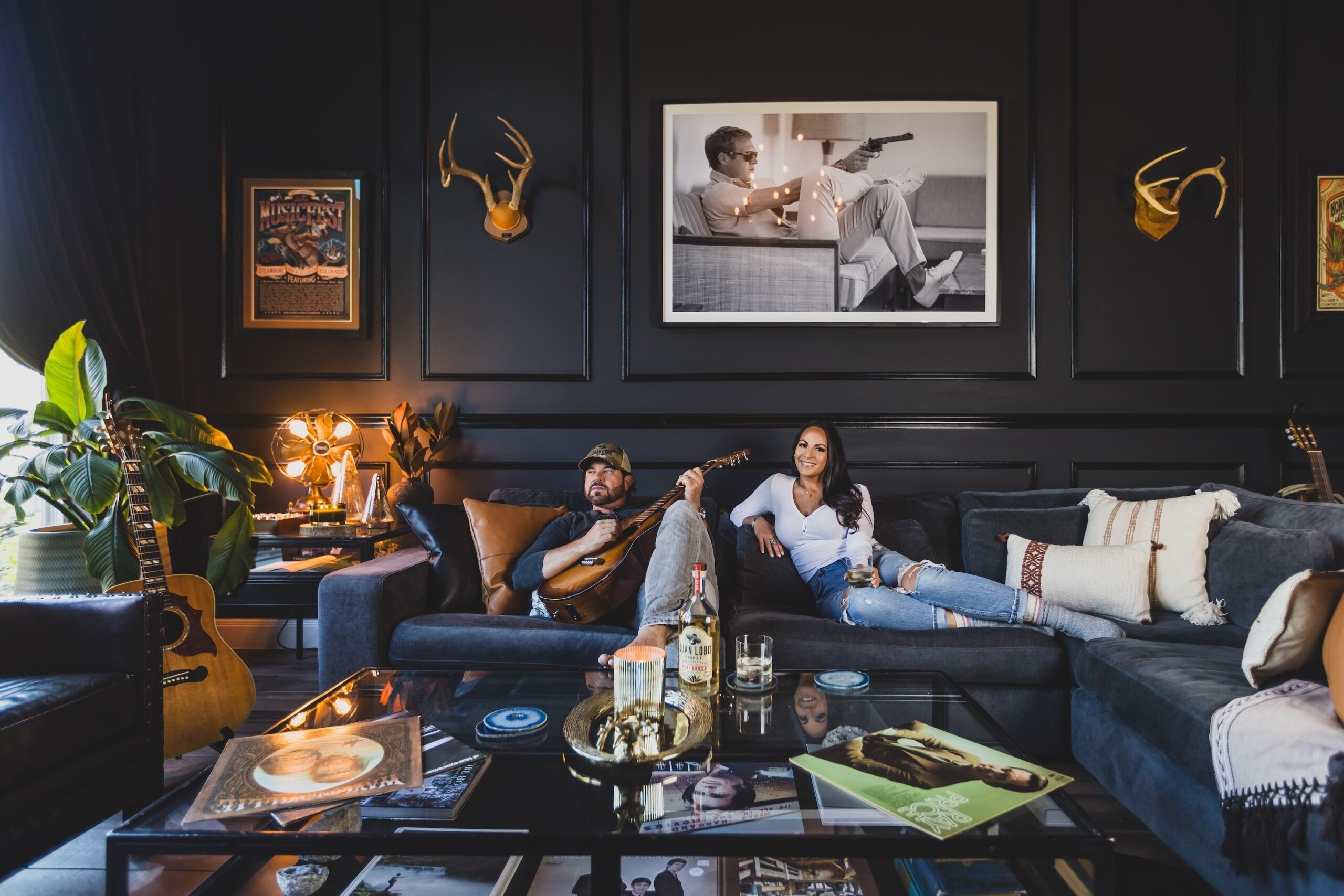The large, grayish-blue sectional couch is a favorite spot where the Wolfes relax.