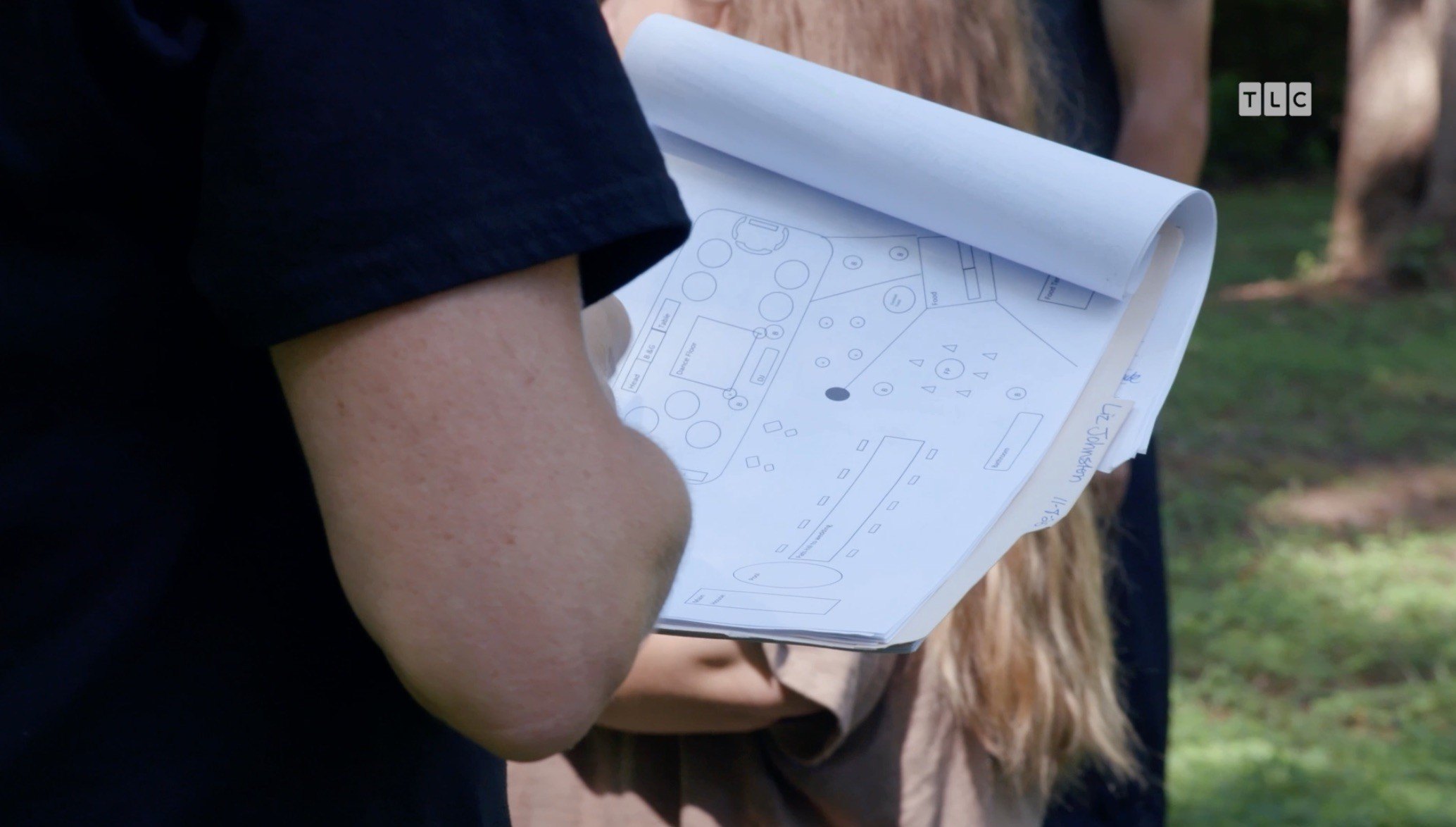 Julie the wedding planner shares sketches of the outdoor event's layout.