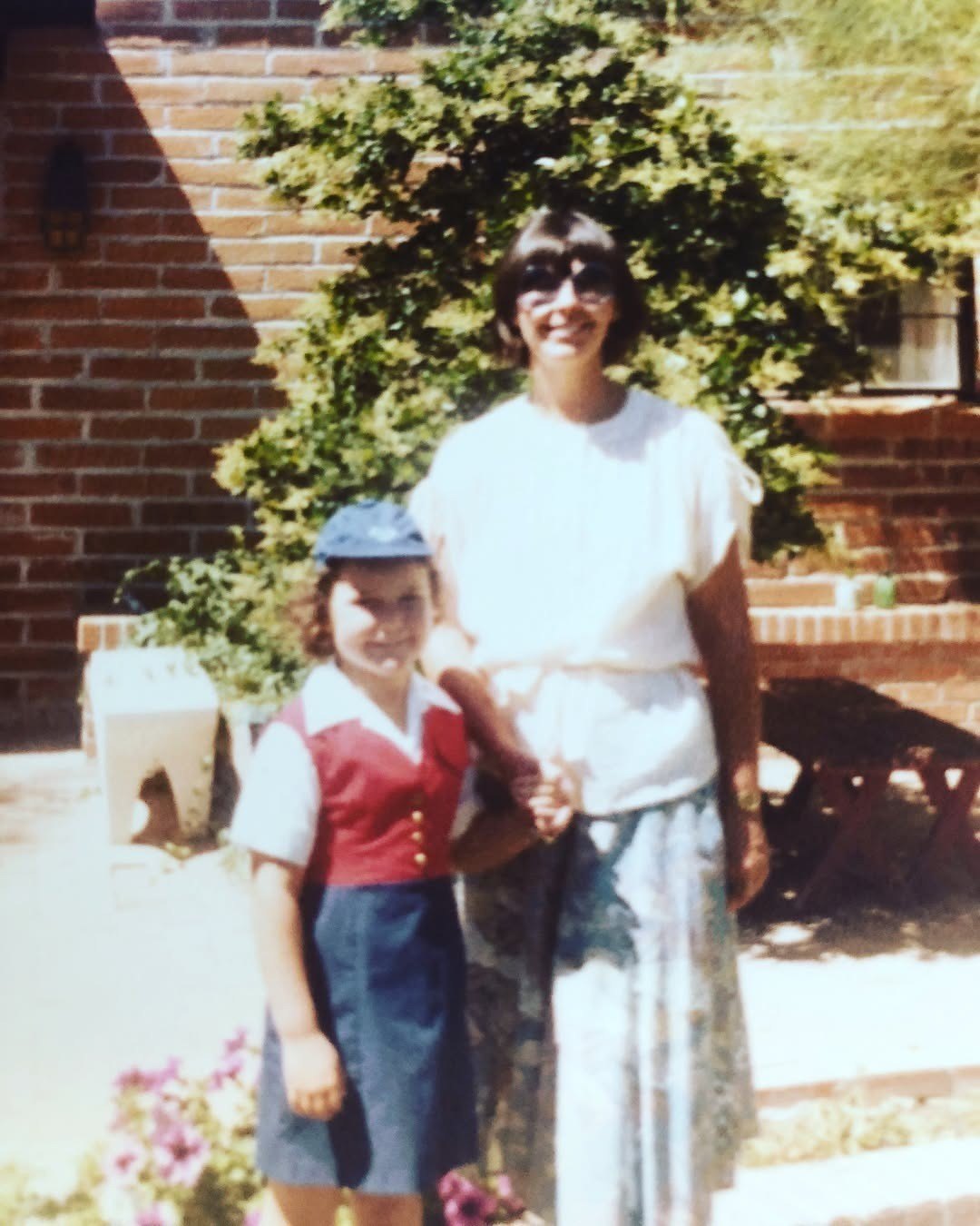 Savannah Guthrie and her mom Nancy Guthrie holding her hand when she was a child