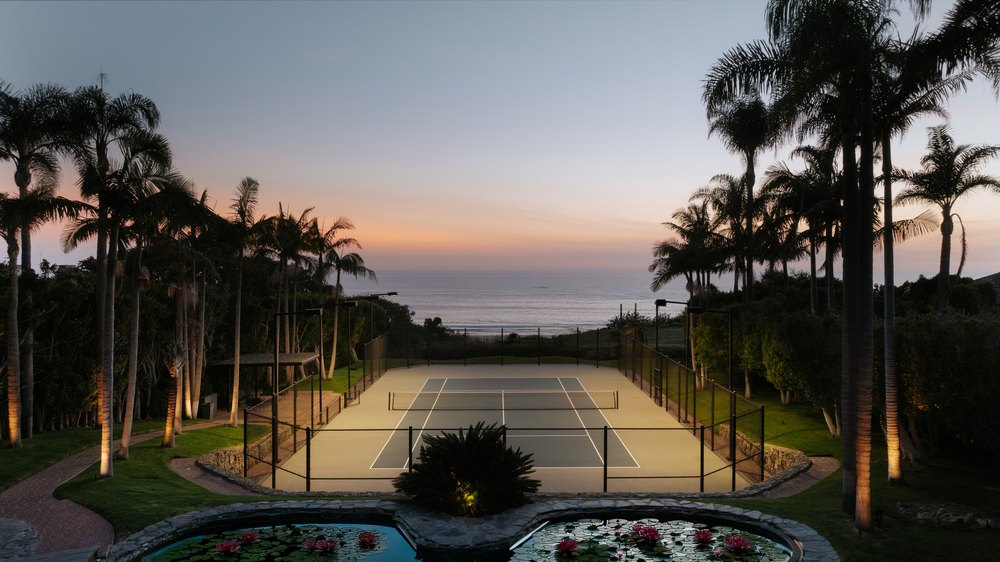 Tennis court at sunset at a home in Malibu belonging to Sean William Scott