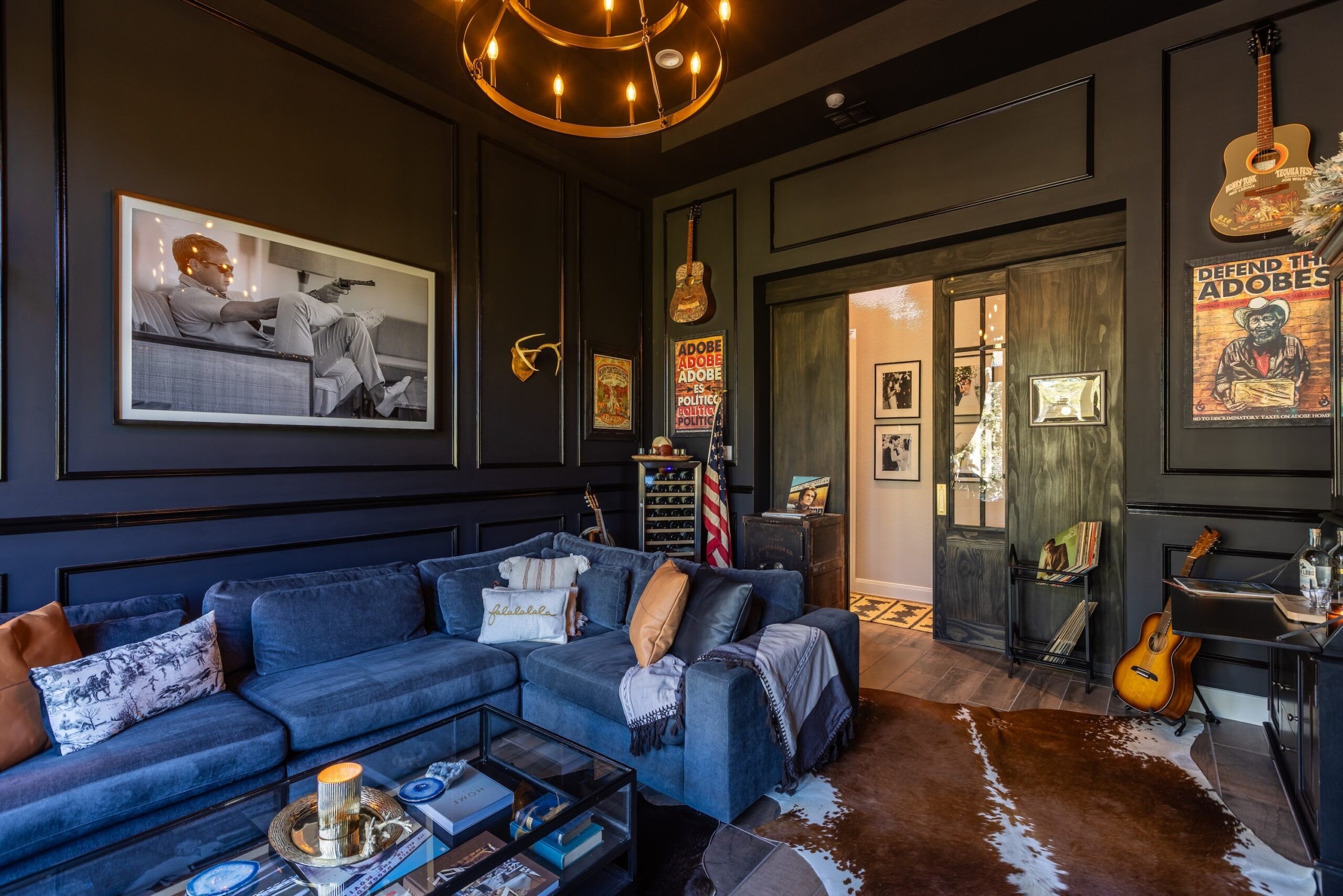 Tour posters from shows Wolfe has performed are some of the most sentimental items in his man cave.