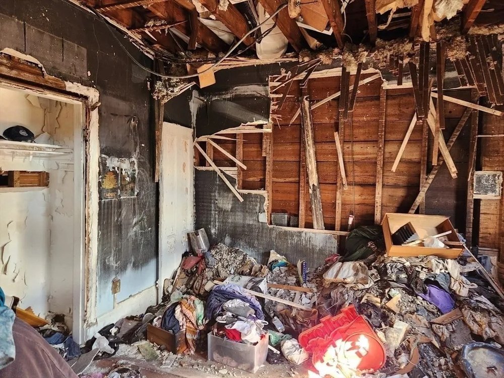 Damaged interior in a burned house in Dorcester Boston