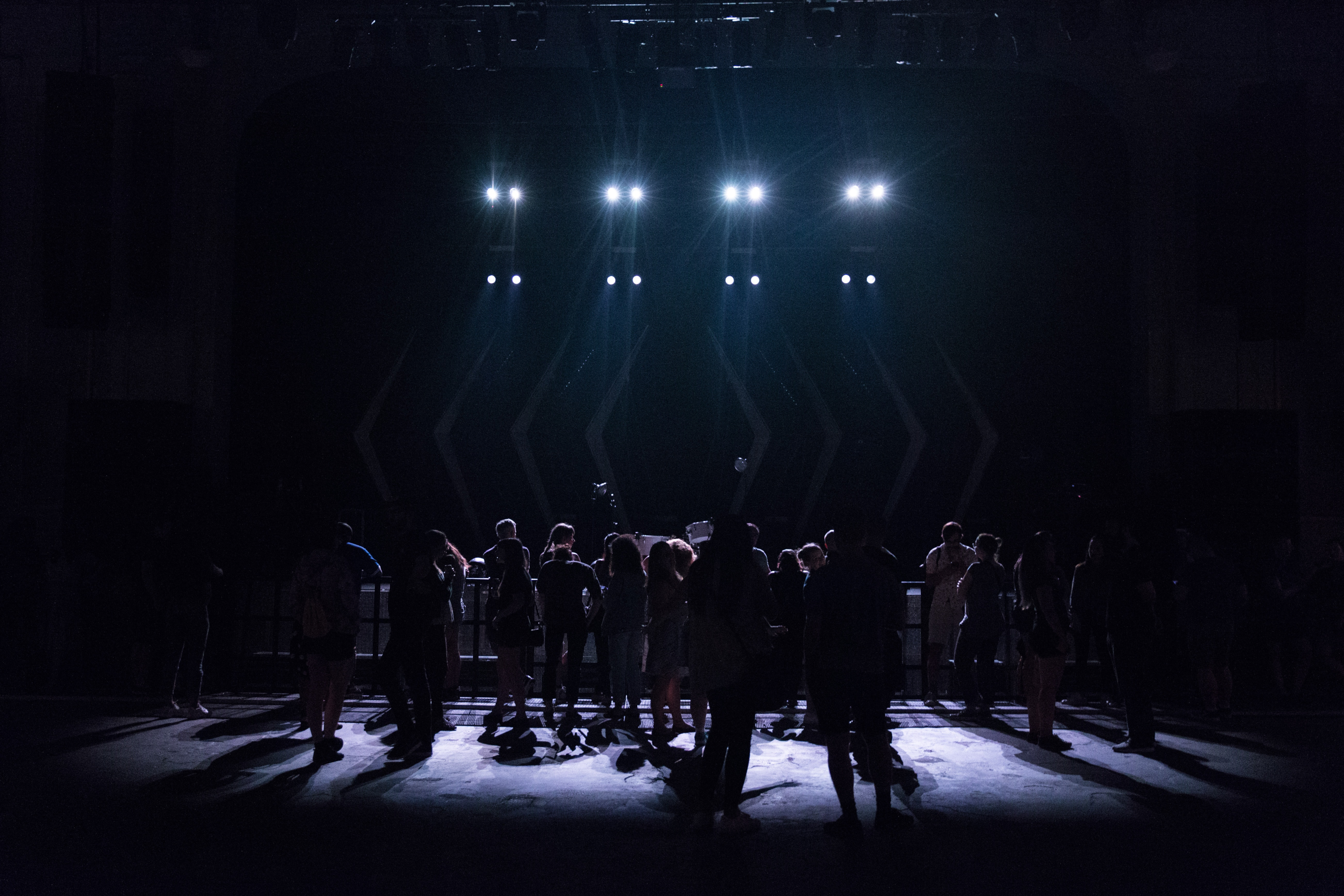 Silhouette of people in a theater